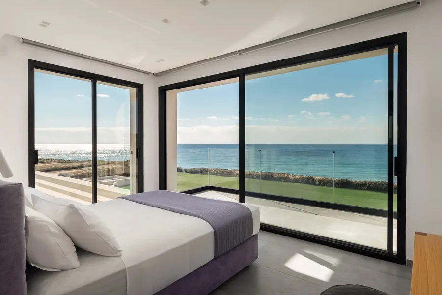 Bedrooms with a private bathroom and stunning views of the sea.